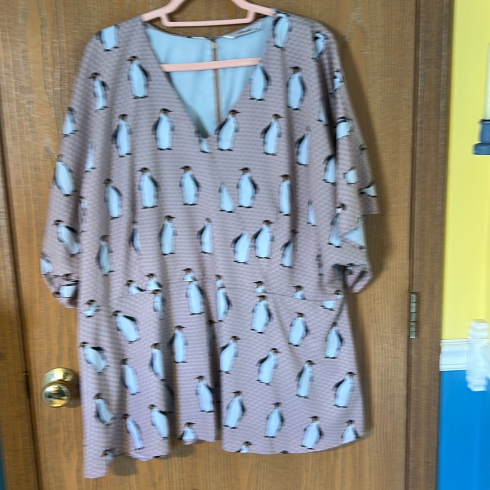 Penguin and polka dot peplum top